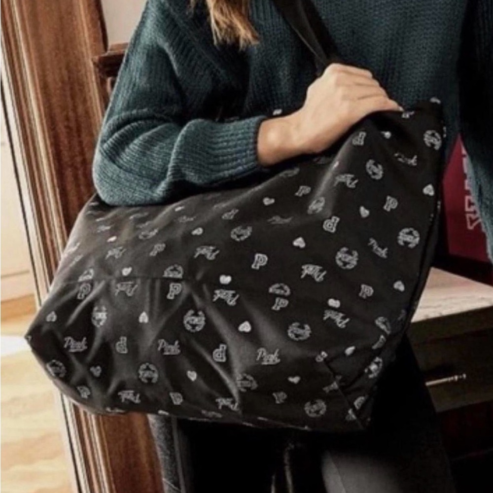 PINK Victoria's Secret Black Travel Bag with Foil Logo Pattern